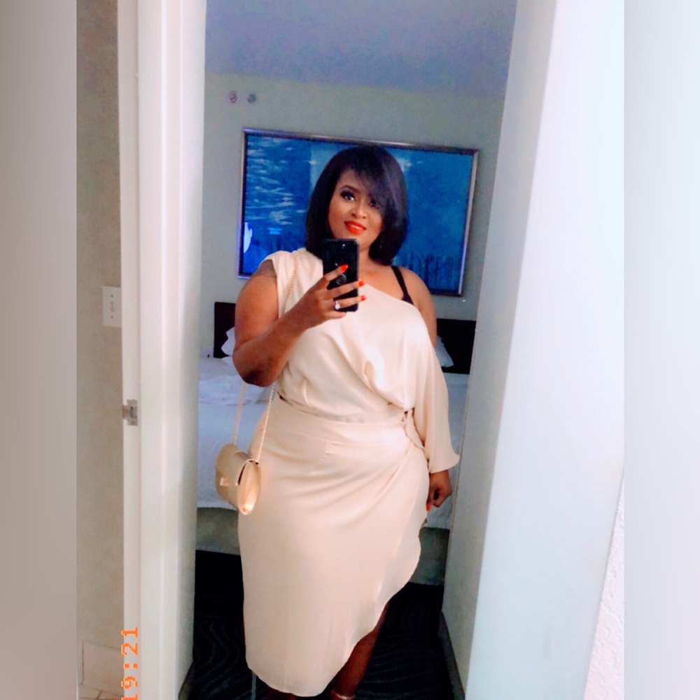 Silk two piece dress set. It can be worn tucked in or out.